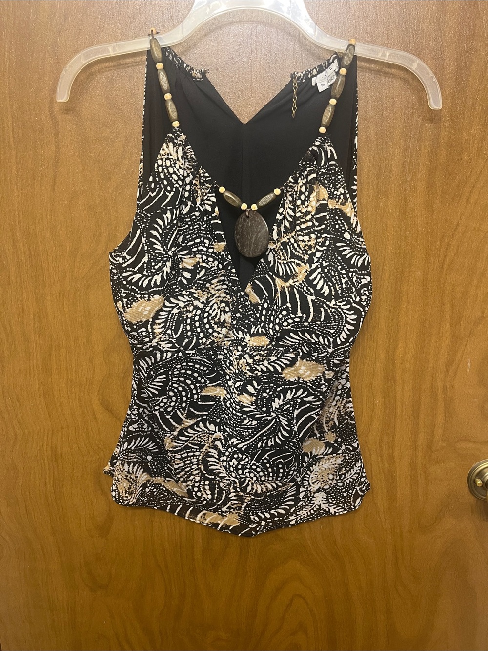 CeCe Black Tank Top with Cream & Gold Print and Beaded Pendant